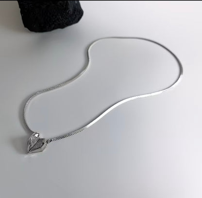 3D Multi-faceted
Diamond-Studded Heart Pendant Necklace