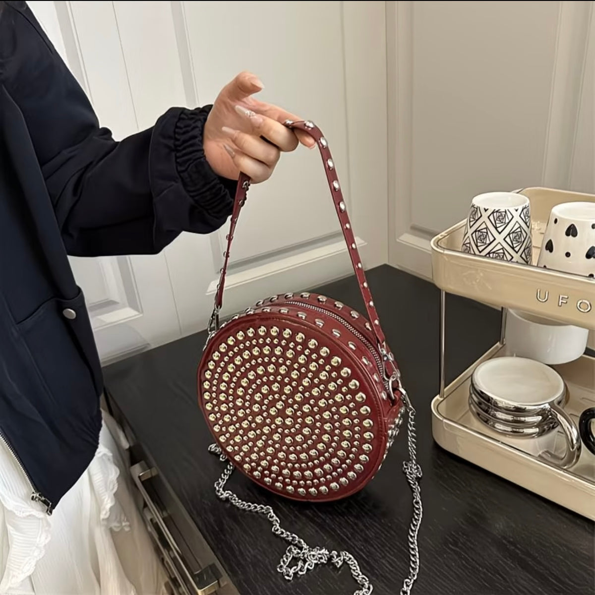 Vintage-style , crossbody shoulder bag with metal rivets, versatile chain-strap handbag