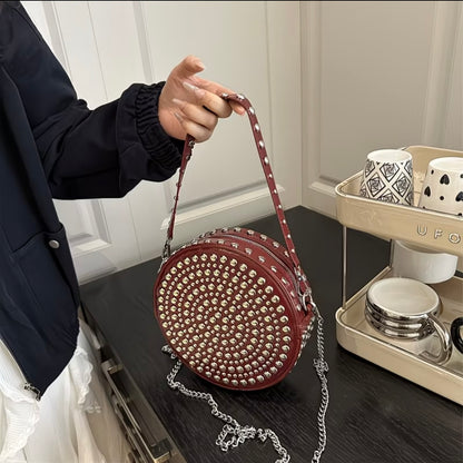 Vintage-style , crossbody shoulder bag with metal rivets, versatile chain-strap handbag
