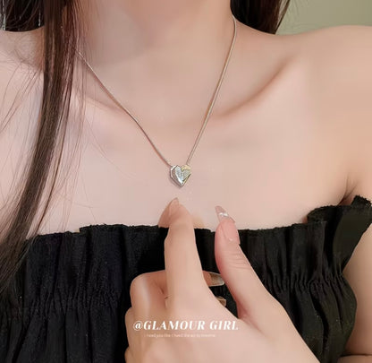 3D Multi-faceted
Diamond-Studded Heart Pendant Necklace