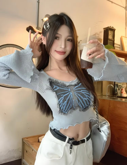 Light blue butterfly-detail knit crop top with flared sleeves